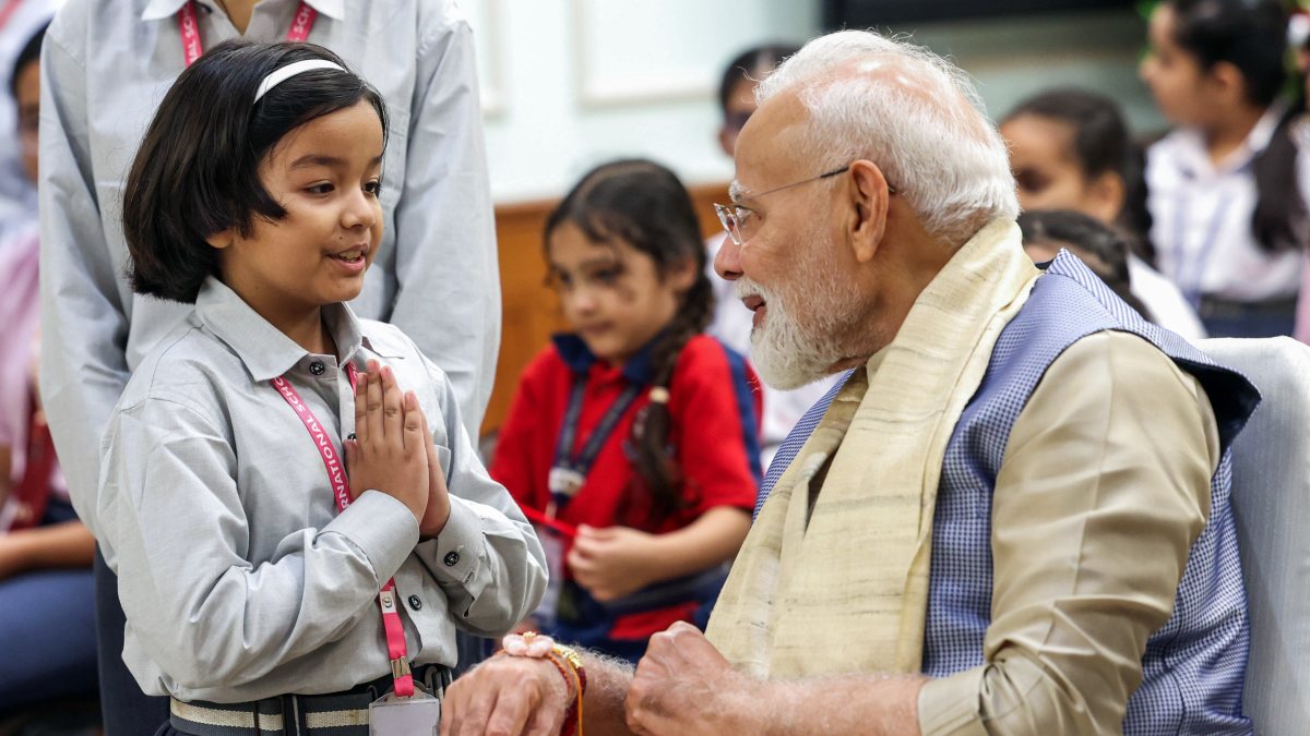 PM Modi greets school student at Raksha Bandhan event in Delhi