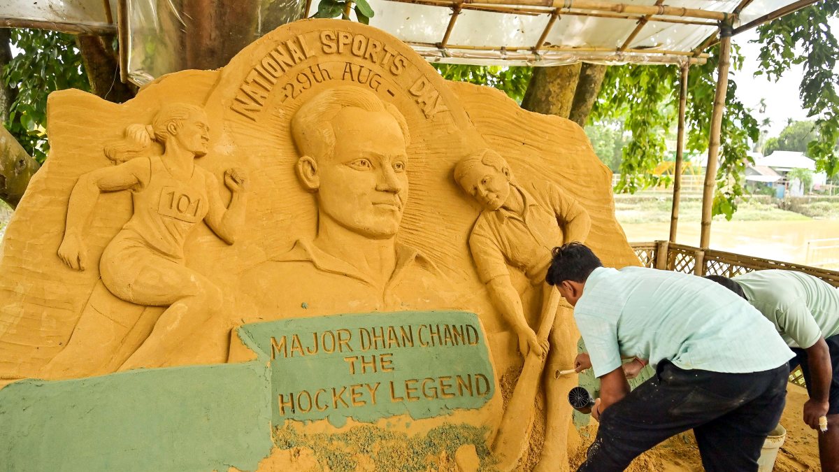 Sand artist adds final touches to Dhyan Chand sculpture on Sports Day eve