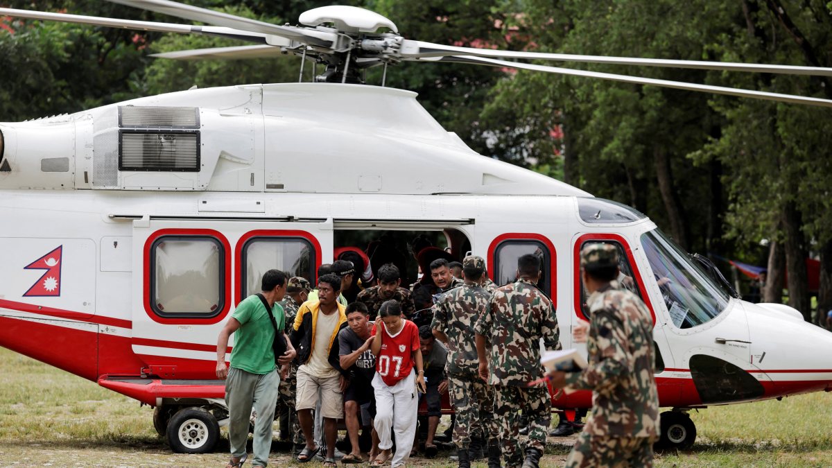 Flood survivors airlifted to army base in Nepal