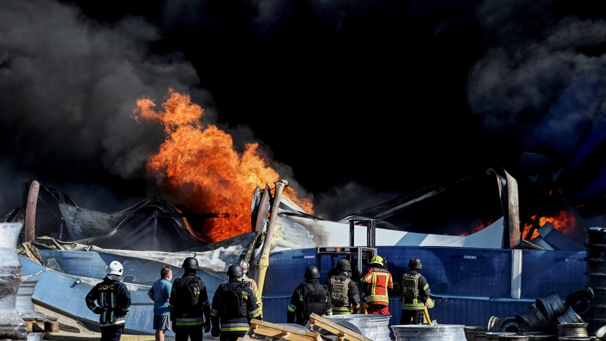 Firefighters battle blaze after Russian drone strike in Kyiv