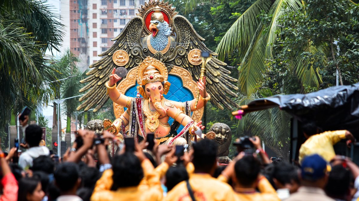 Adani Group members carry Ganesh idol ahead of festival in Mumbai