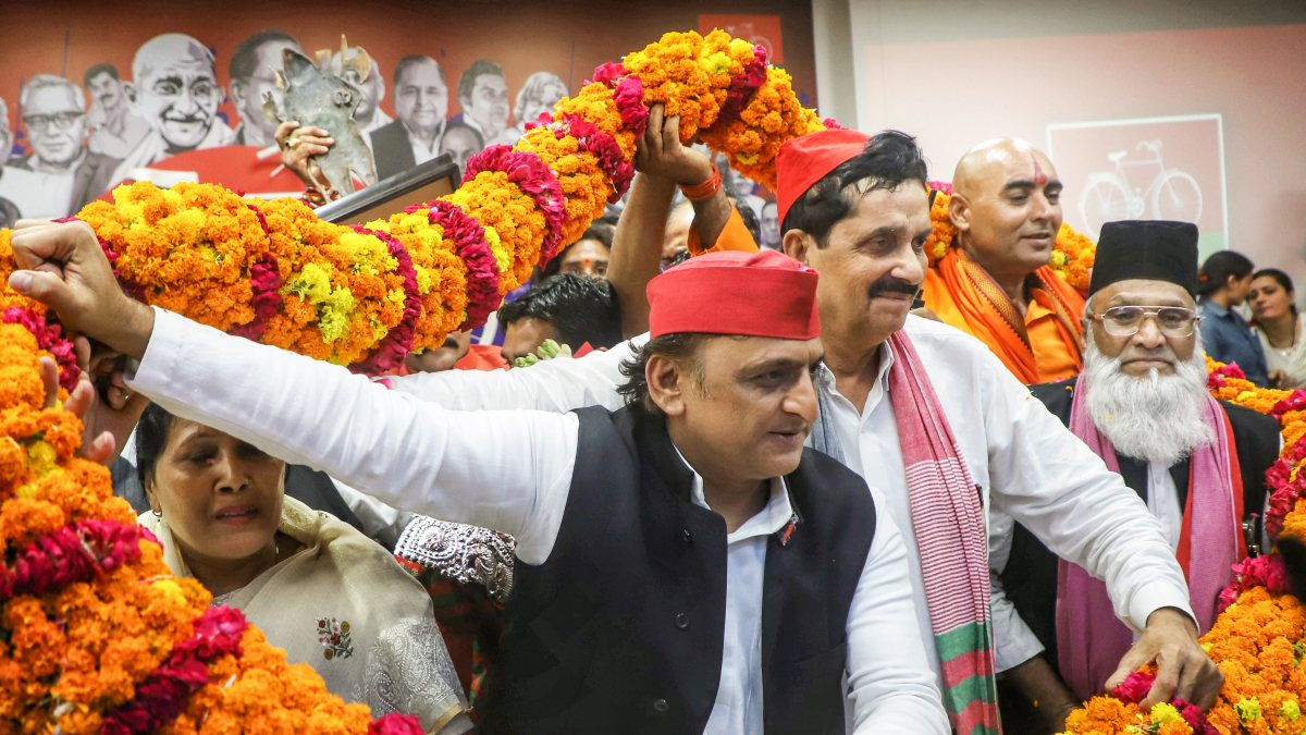 Akhilesh Yadav garlanded at SP office press conference in Lucknow