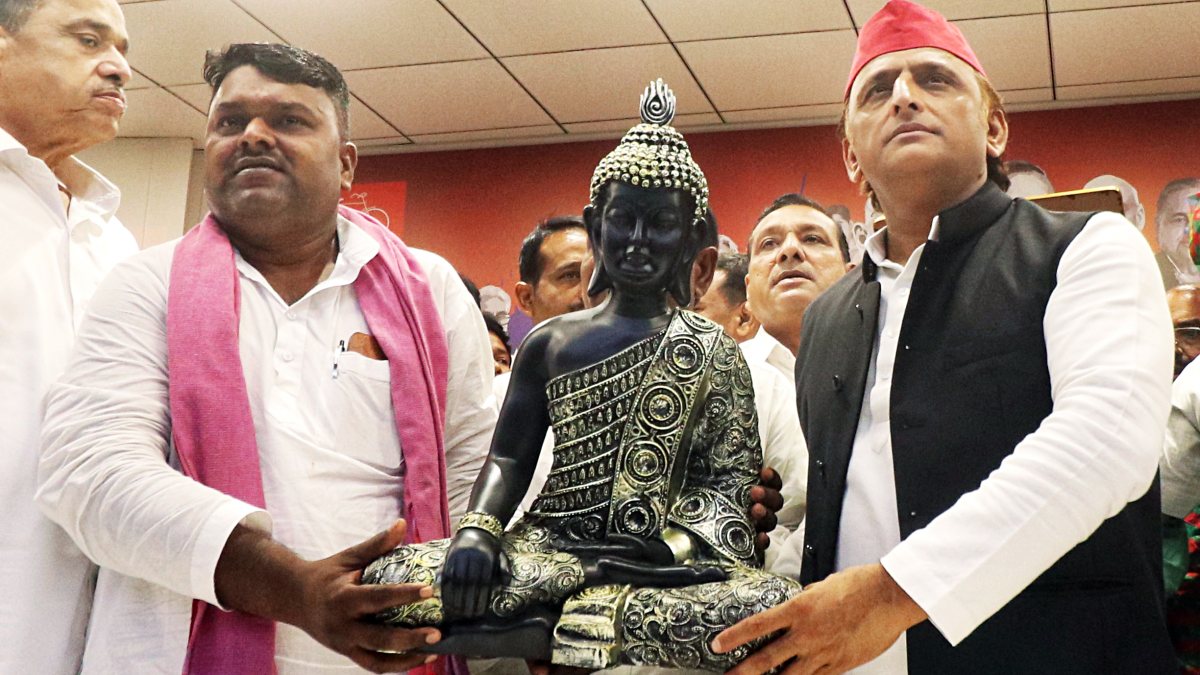 Akhilesh Yadav poses with Lord Buddha idol at Lucknow press meet