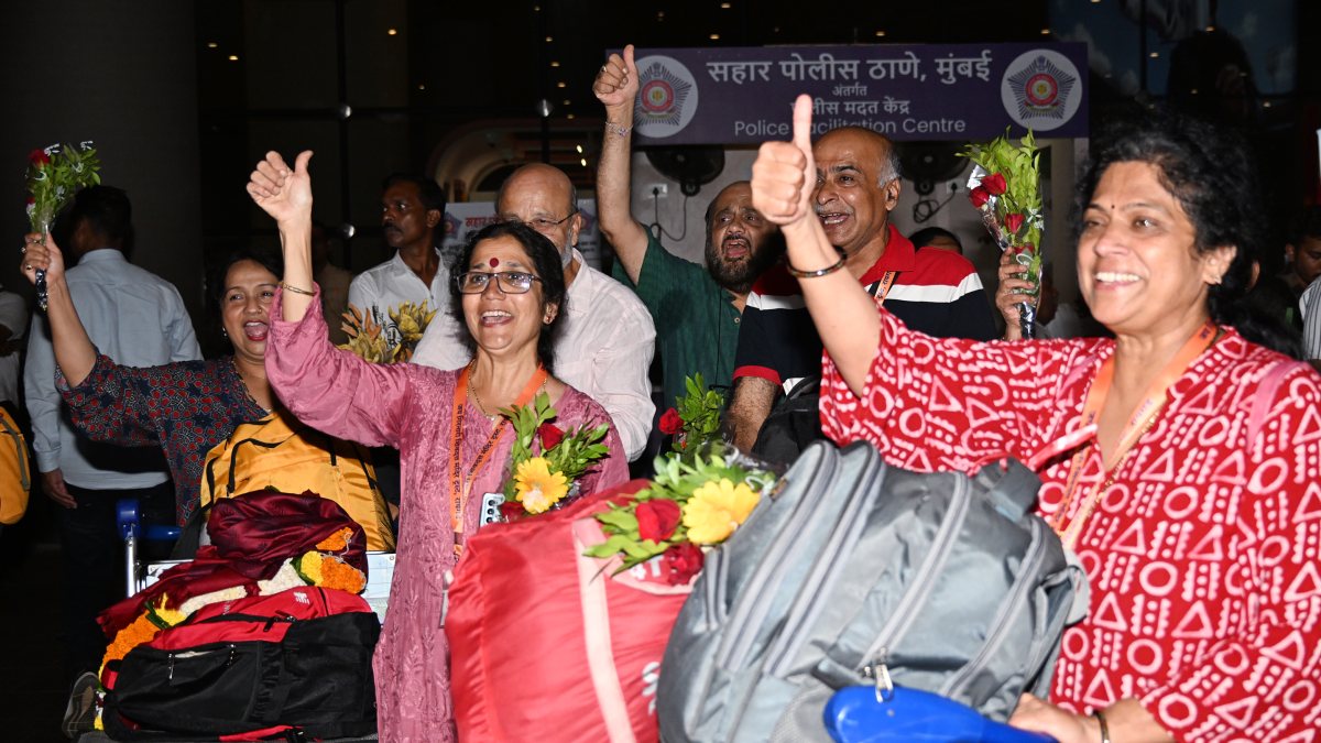 Passengers reunite with families after Nepal floods at Mumbai airport