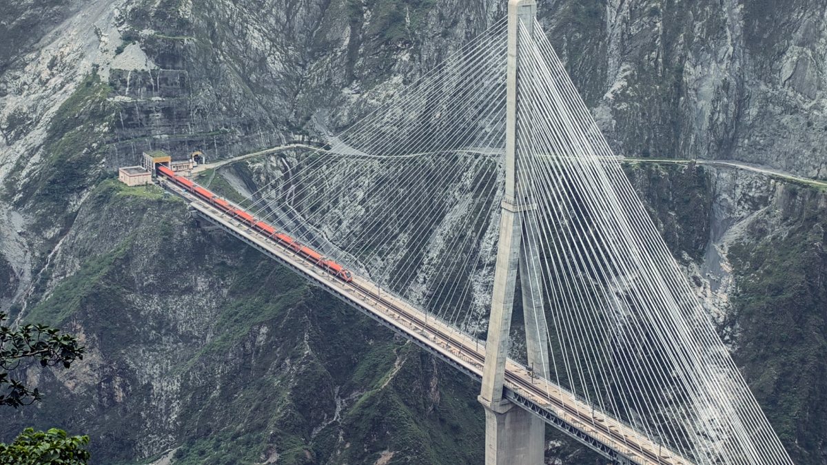 Vande Bharat train crosses India's first cable-stayed rail bridge in Reasi