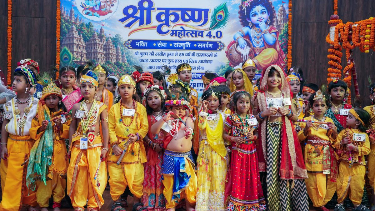 Children in Krishna-Radha costumes pose ahead of Janmashtami
