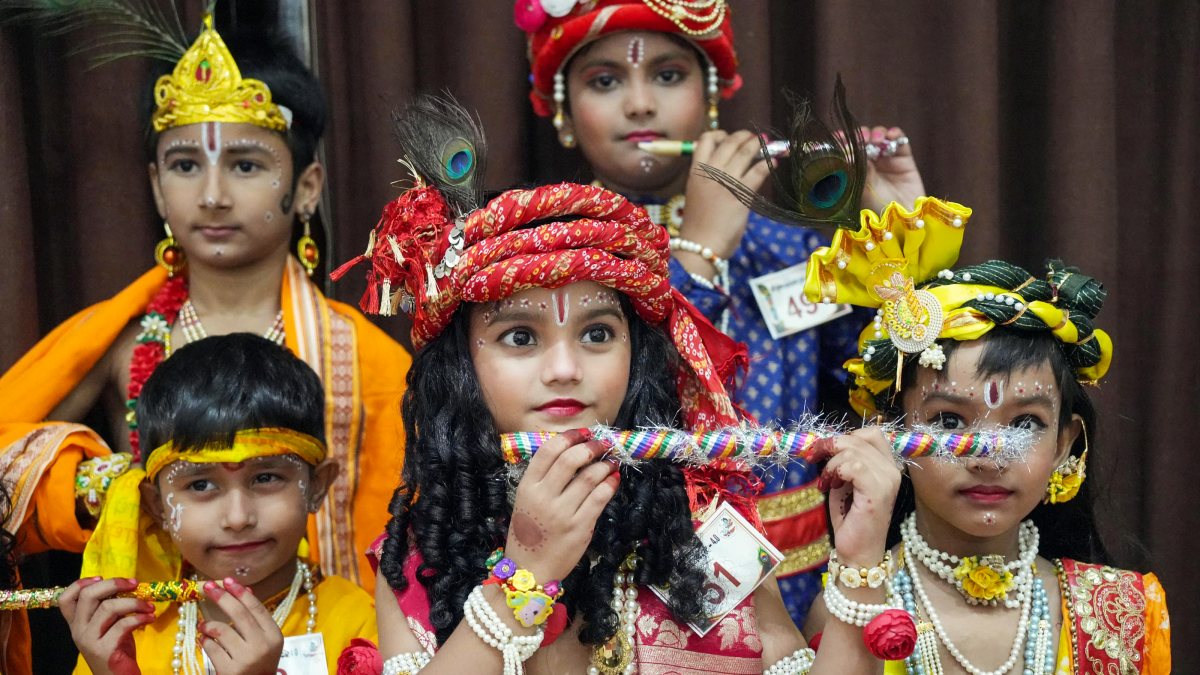 Children in Krishna-Radha costumes at Patna Janmashtami event
