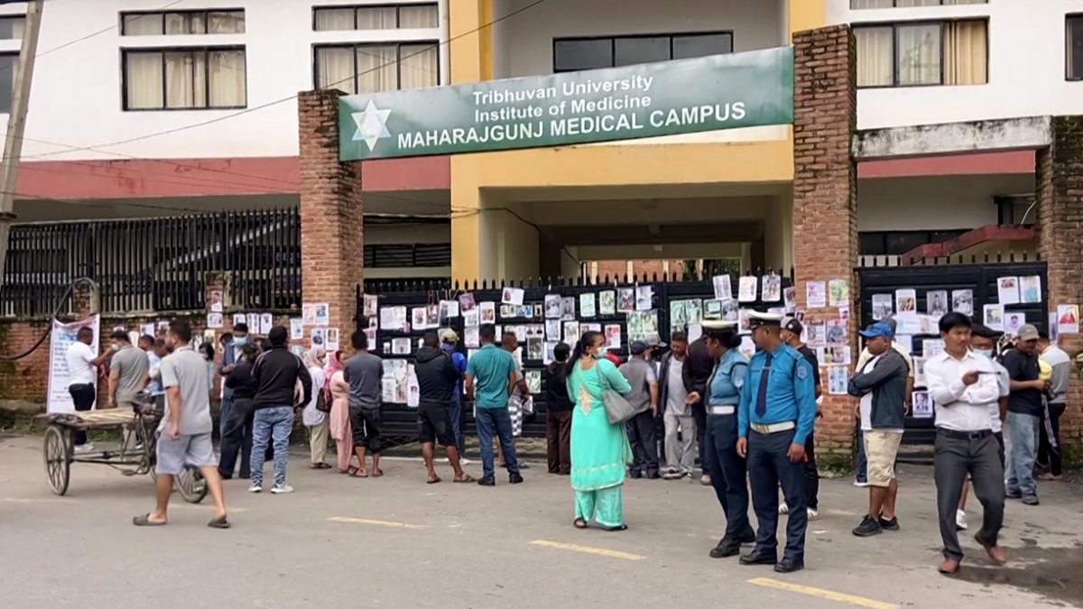Families view photos of flood missing in Kathmandu