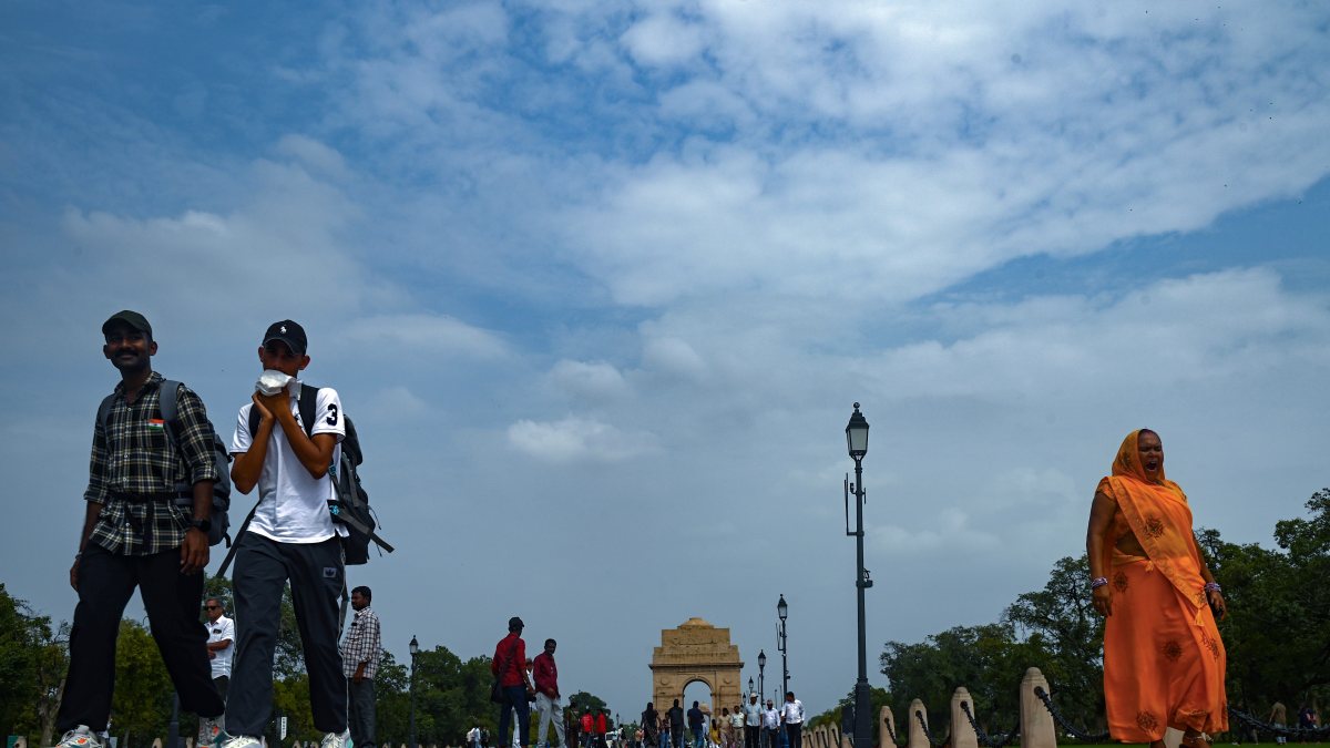 Blue sky and clouds hover over Kartavya Path near India Gate