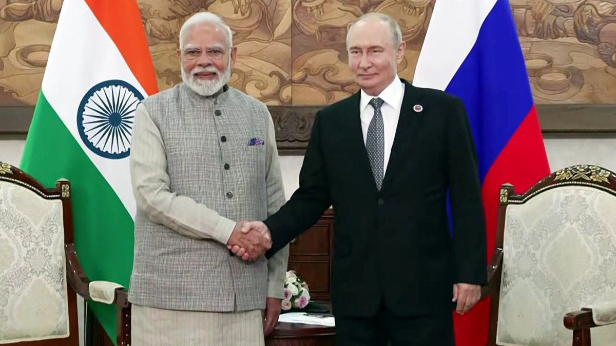 Modi and Putin shake hands ahead of SCO bilateral talks