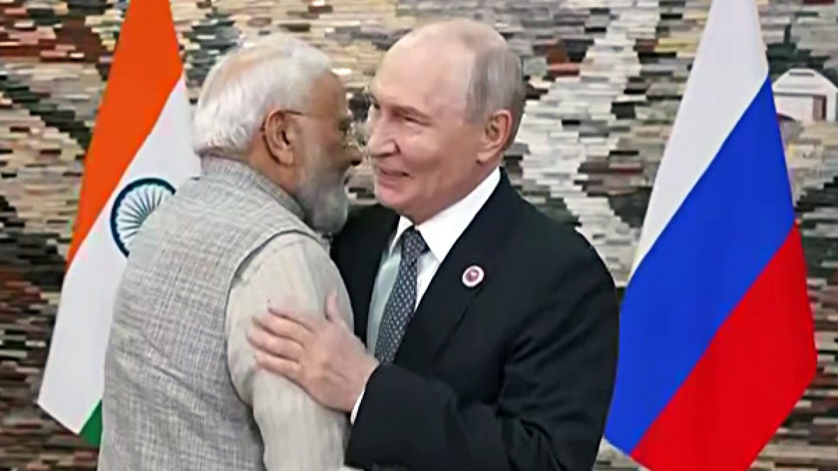 Modi and Putin embrace during bilateral talks at SCO summit