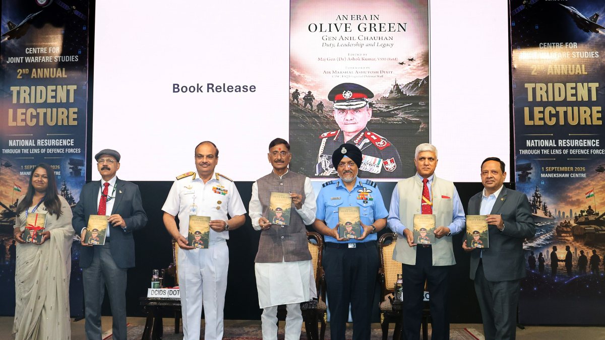 Defence minister launches book on Gen Anil Chauhan at Trident Lecture
