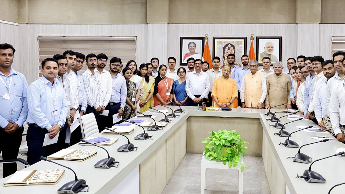 Yogi Adityanath poses with new UPPCB officers in Lucknow