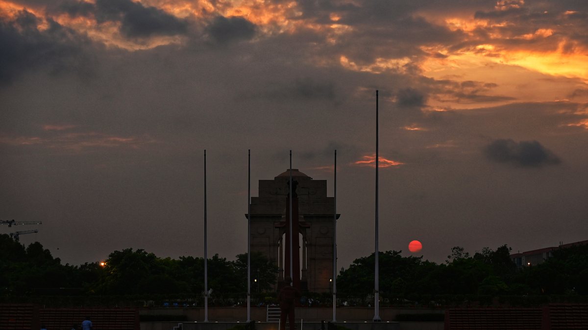 Monsoon clouds loom over India Gate in New Delhi
