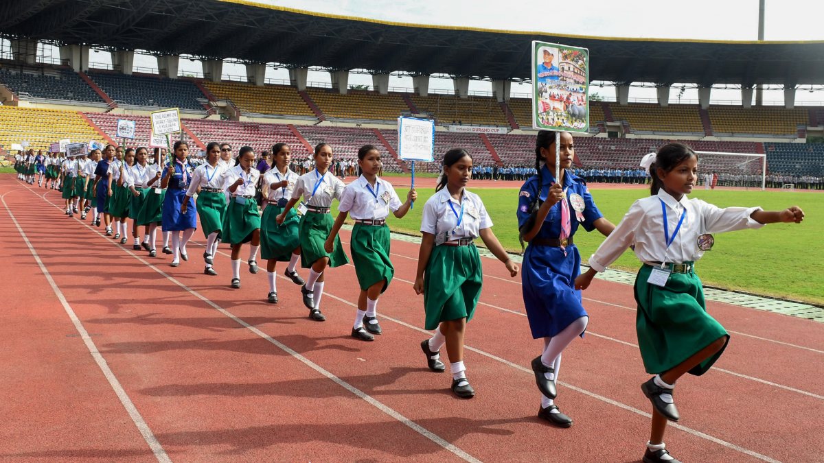 Assam children jog at Abhiruchi Sports Day event