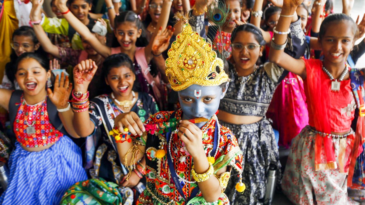 Children in Krishna-Radha costumes pose ahead of Janmashtami