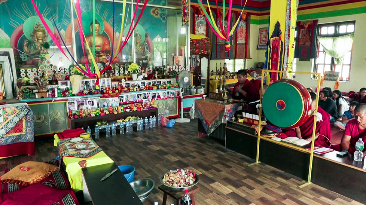 Nepal monastery displays portraits of flash flood missing