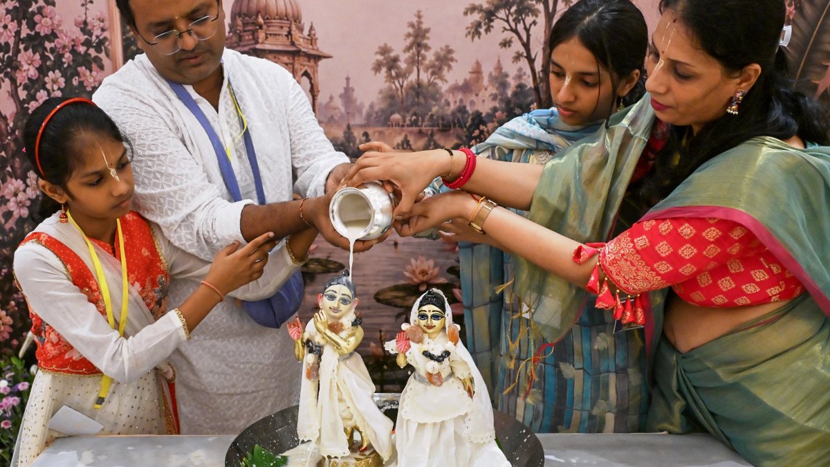 Devotees perform milk abhishek at ISKCON temple ahead of Janmashtami