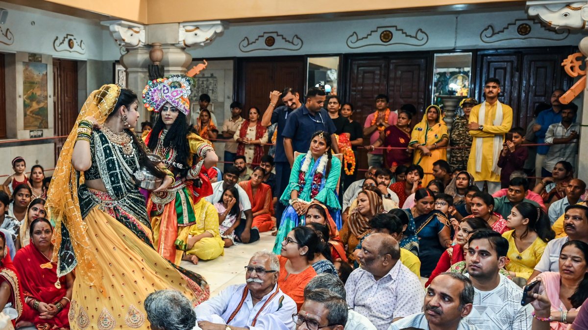 Artists perform as Radha-Krishna at Delhi temple for Janmashtami