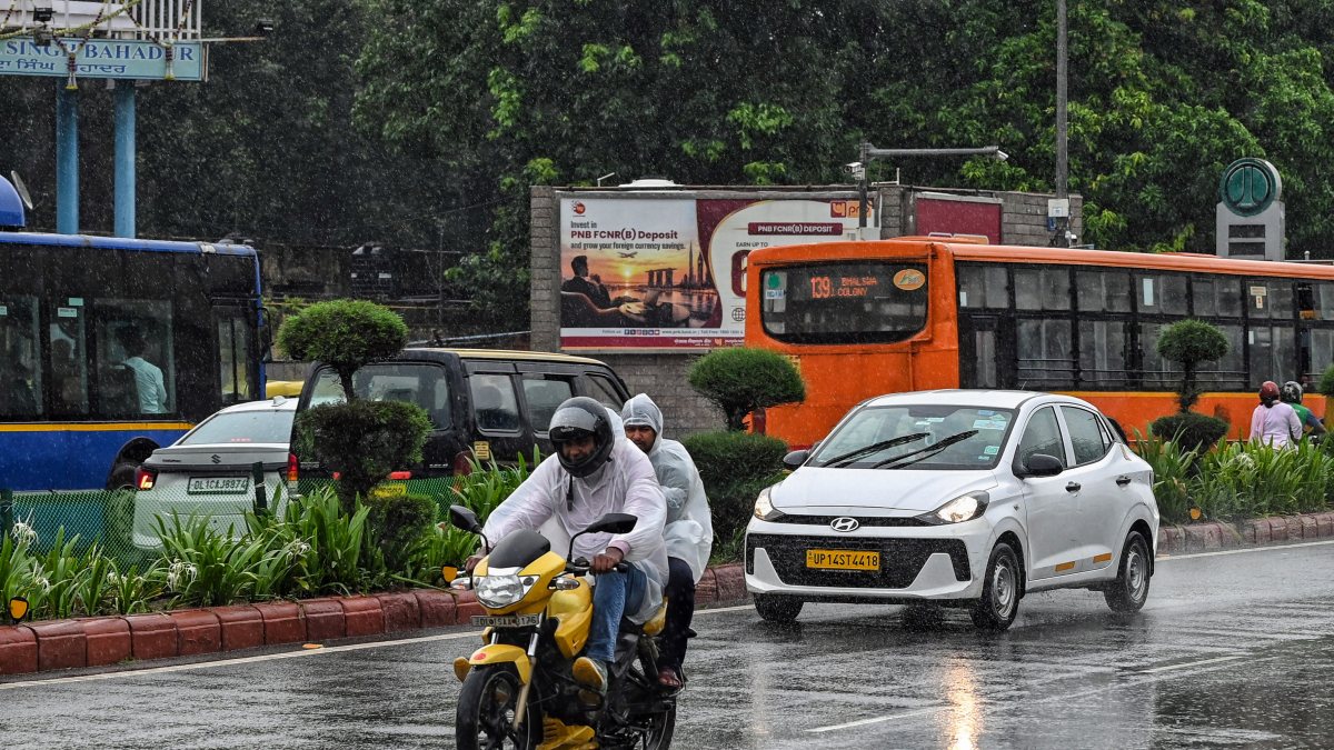Rain-soaked roads disrupt commuters in New Delhi