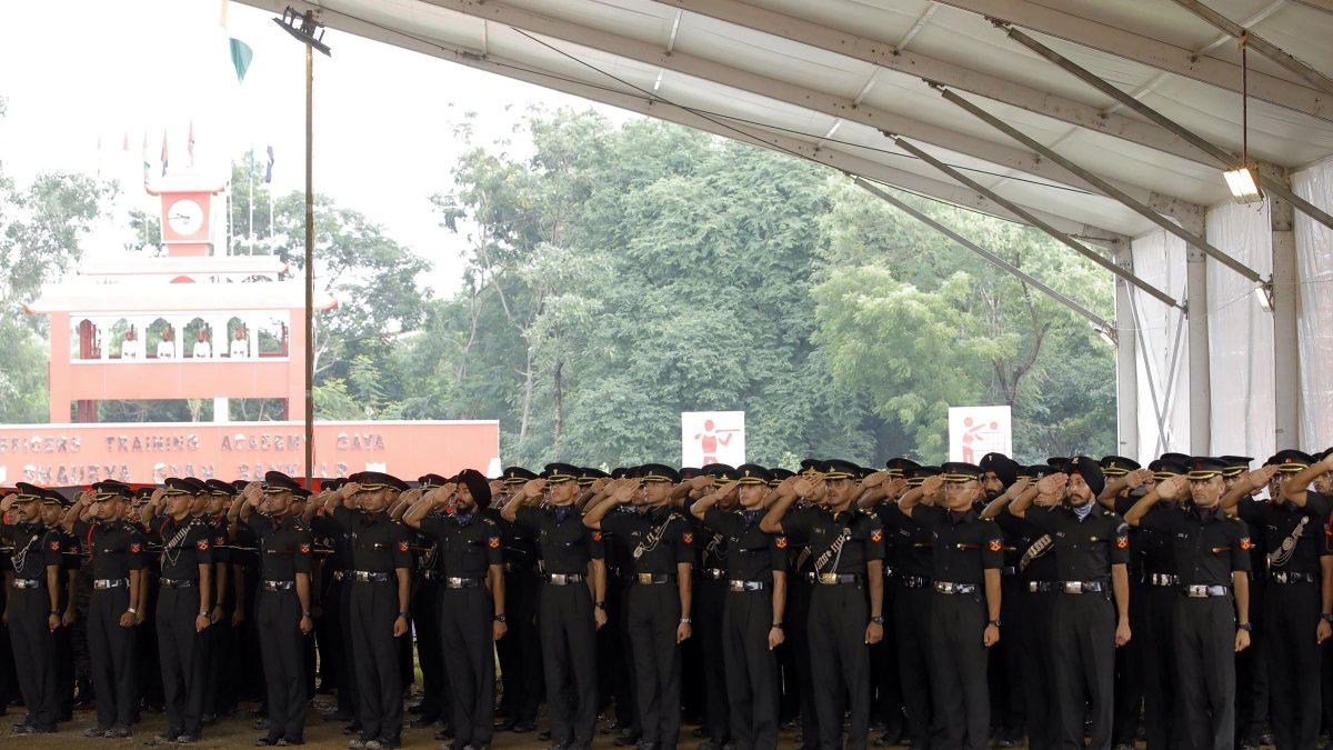 Newly commissioned officers salute at OTA Gaya ceremony