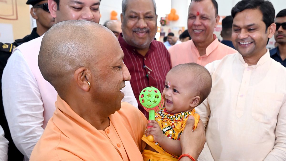 Yogi Adityanath plays with child at Teachers' Day event