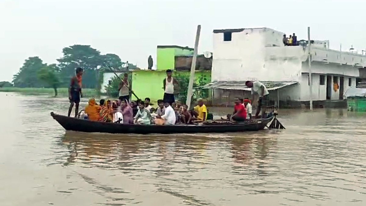 Bihar floods: Residents navigate rising Ganga waters by boat