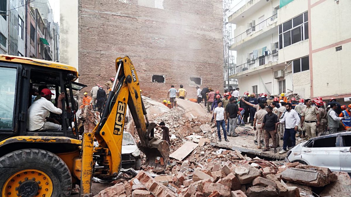 Rescue operations continue at Satya Niketan building collapse site