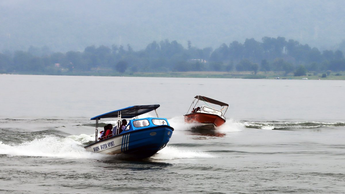 Tourists enjoy boat rides at Patratu Valley lakeside