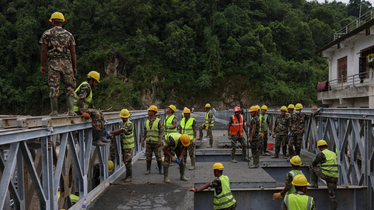 Nepal Army builds iron bridge after deadly flash floods