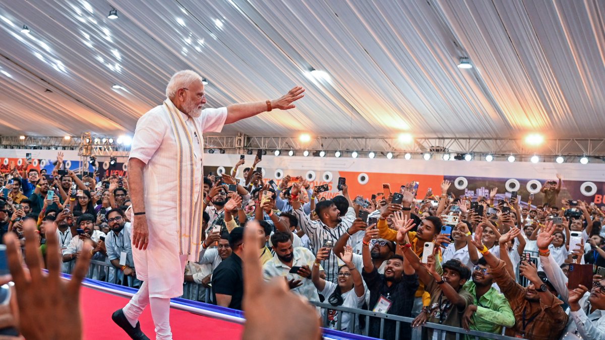 PM Modi waves at supporters at Vadodara event