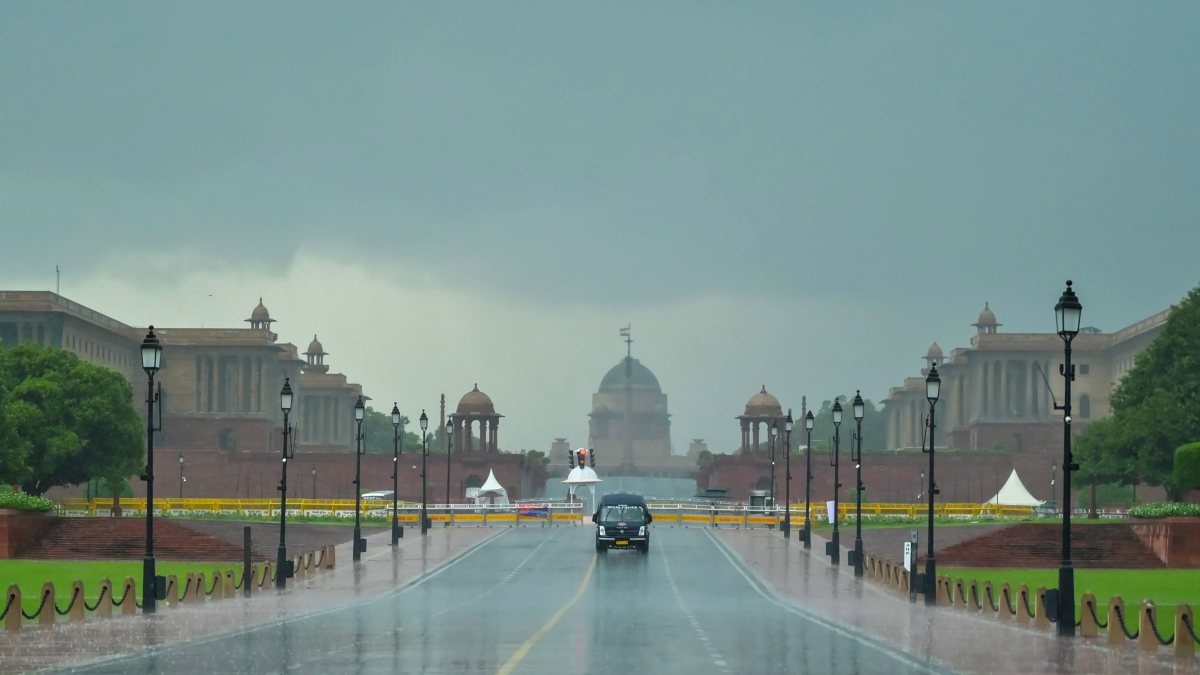 Heavy rain lashes New Delhi as vehicle moves along Kartavya Path