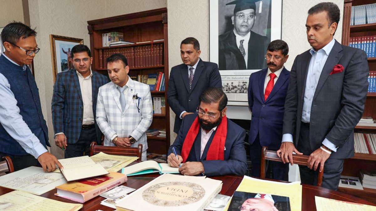 Maharashtra CM Eknath Shinde signs visitor book at Ambedkar House in London