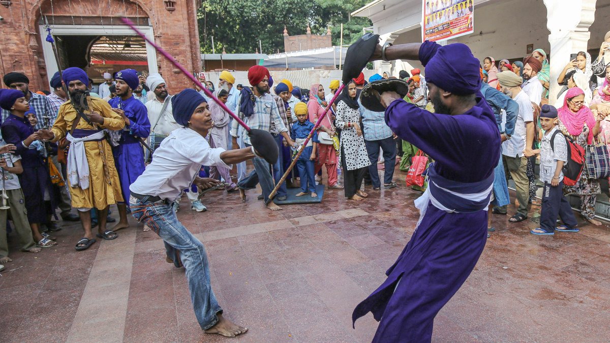 Nihang Sikhs perform Gatka outside Golden Temple in Amritsar