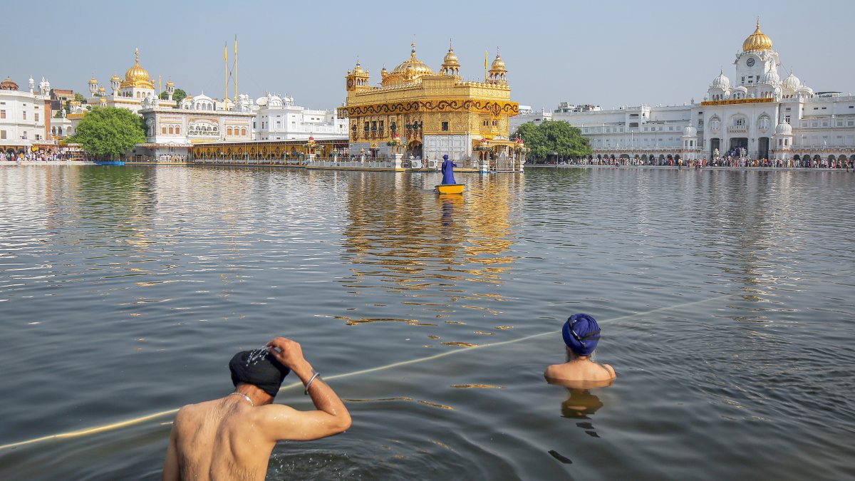 Sikh devotees take holy dip at Golden Temple during Parkash Purab