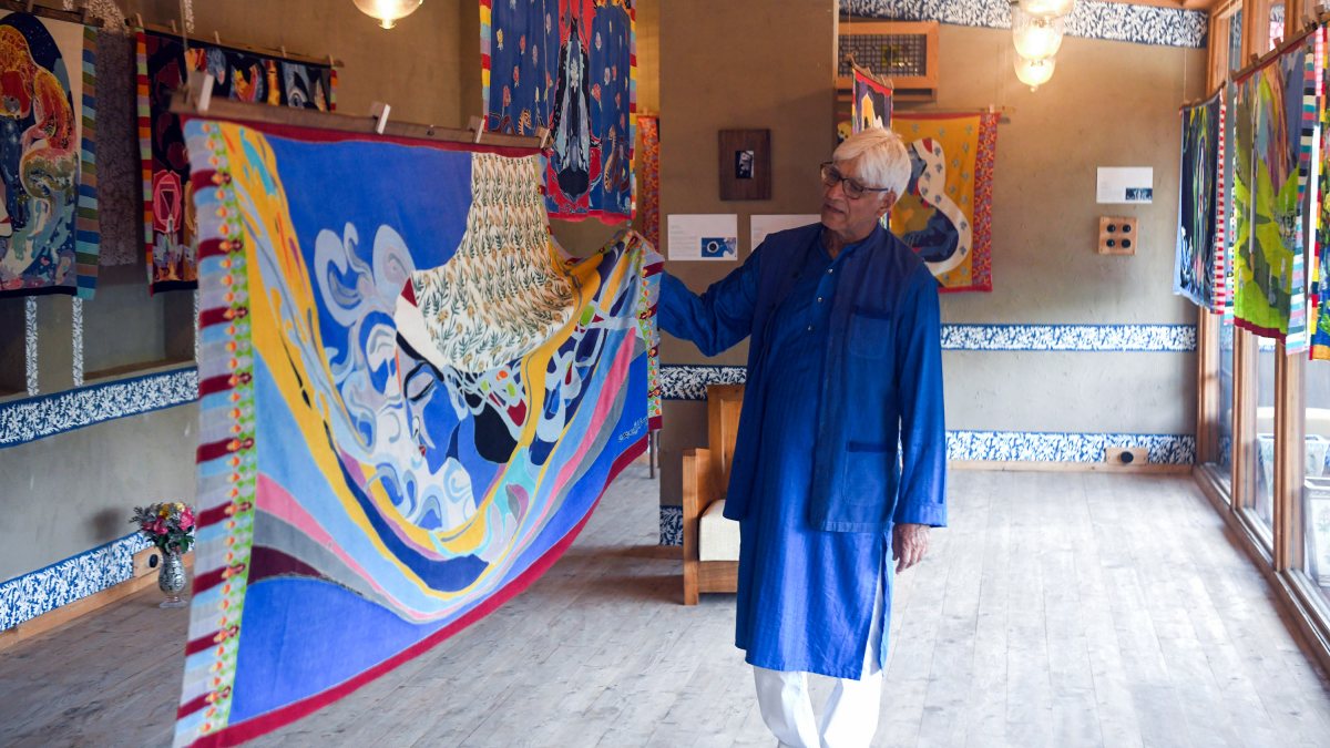 Hand-painted Pashmina shawl inspired by Lal Ded Vakhs displayed in Srinagar