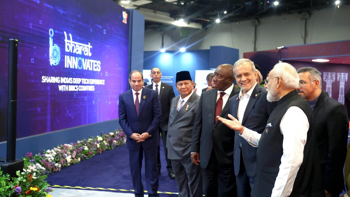 PM Modi and Iran president interact at BRICS exhibition