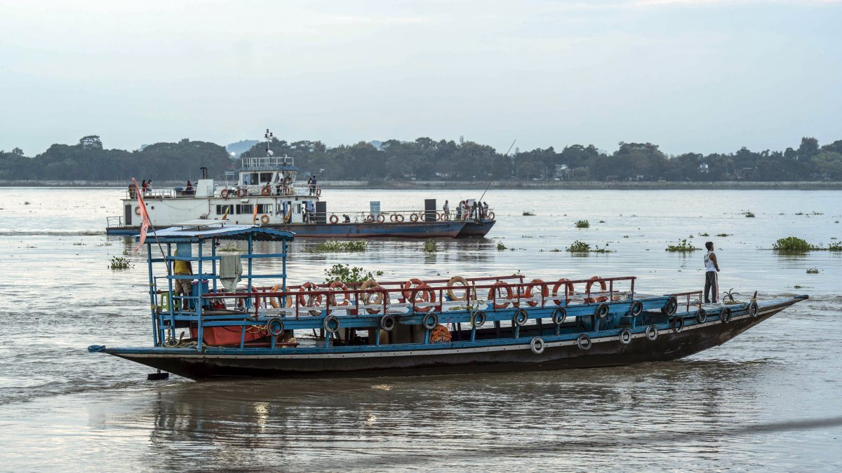 Two ferries navigate Brahmaputra River in Guwahati