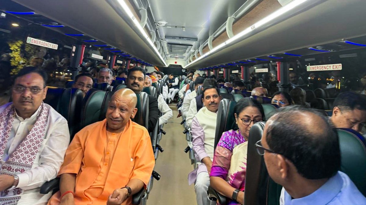 Yogi Adityanath and other leaders travel by bus to Bharat Mandapam