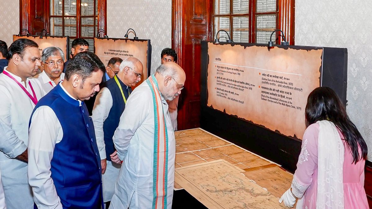 Amit Shah views artefacts at Asiatic Society Mumbai