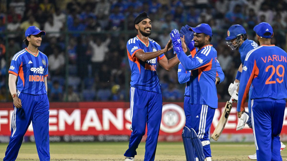 India celebrate Sediqullah Atal wicket in first T20I