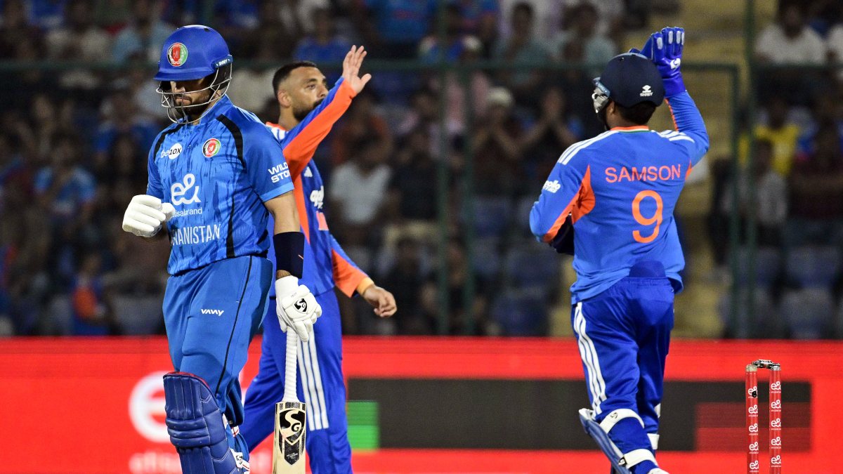 India celebrate Darwish Rasooli wicket in first T20I
