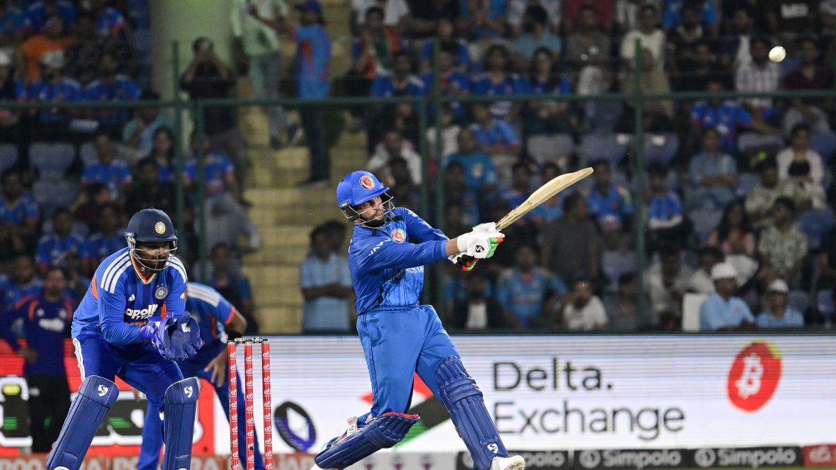 Afghanistan's Azmatullah Omarzai plays a shot in 1st T20I against India