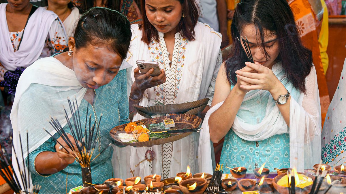 Devotees light lamps at Guwahati Ganesh temple on Ganesh Chaturthi