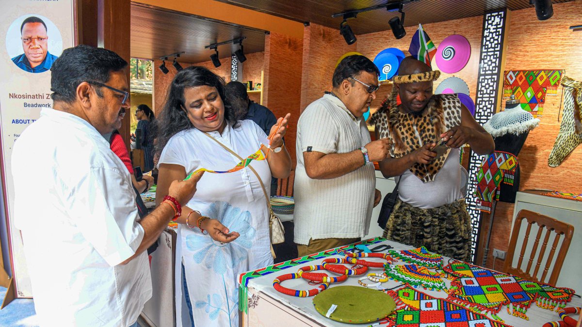 Visitors browse stalls at BRICS Bazar 2026 in New Delhi