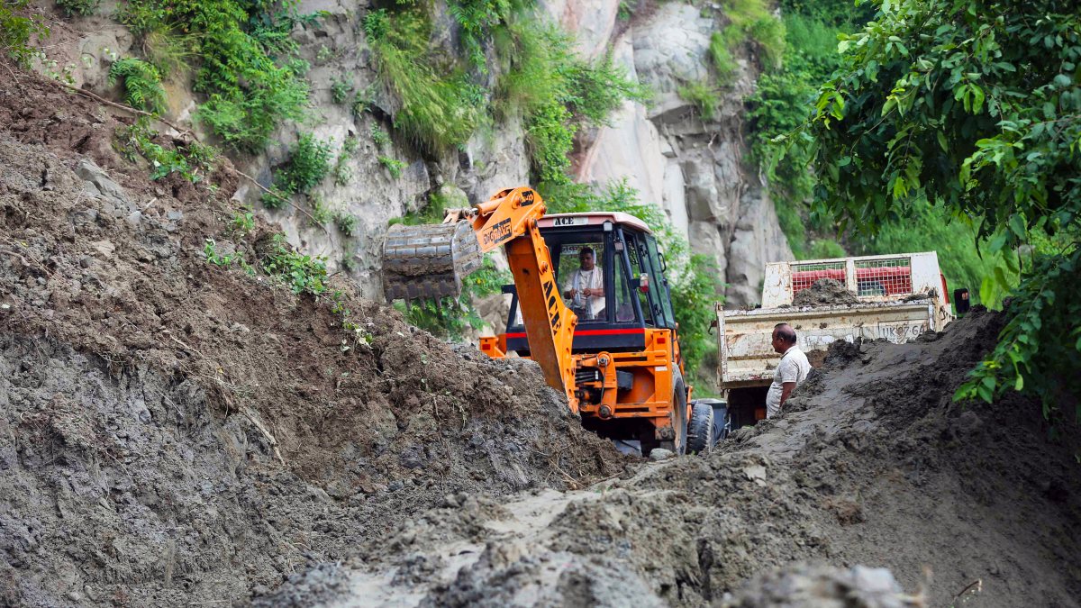 JCB clears debris after landslide on Mansa Devi route in Haridwar