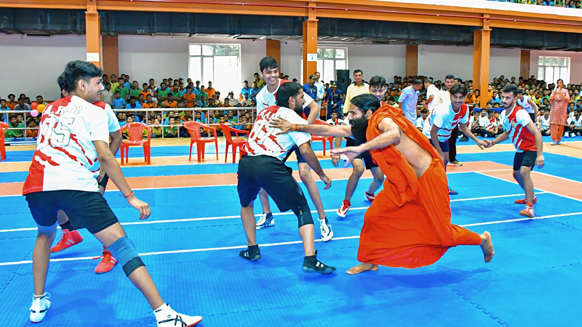 Baba Ramdev plays kabaddi at Haridwar sports event