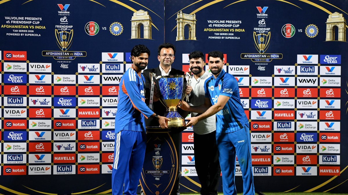India and Afghanistan captains pose with T20I trophy in New Delhi