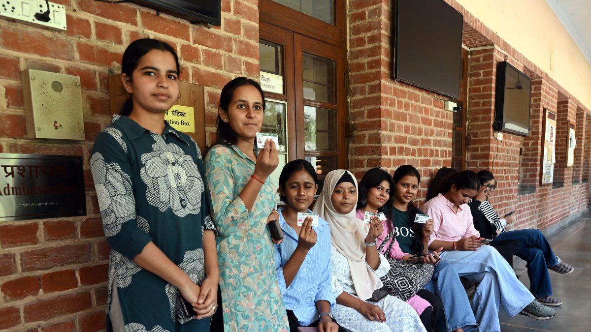 Miranda House students show IDs during DUSU elections