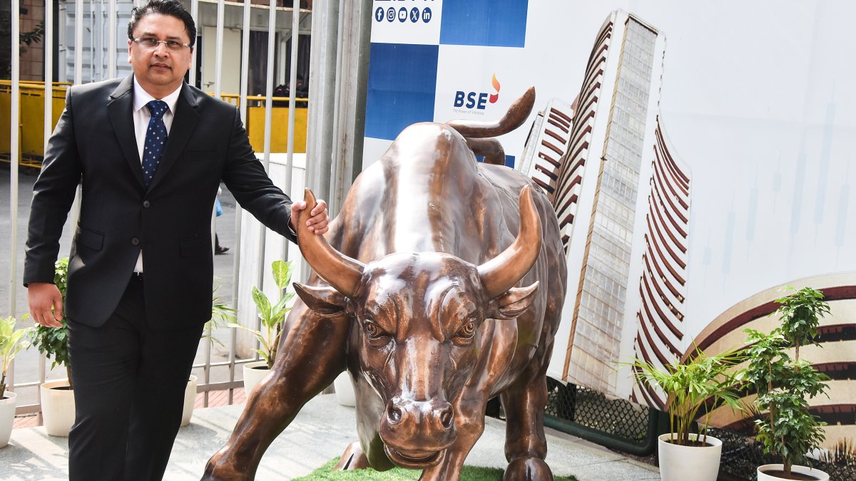Manika Plastech MD poses at BSE Bull during listing ceremony